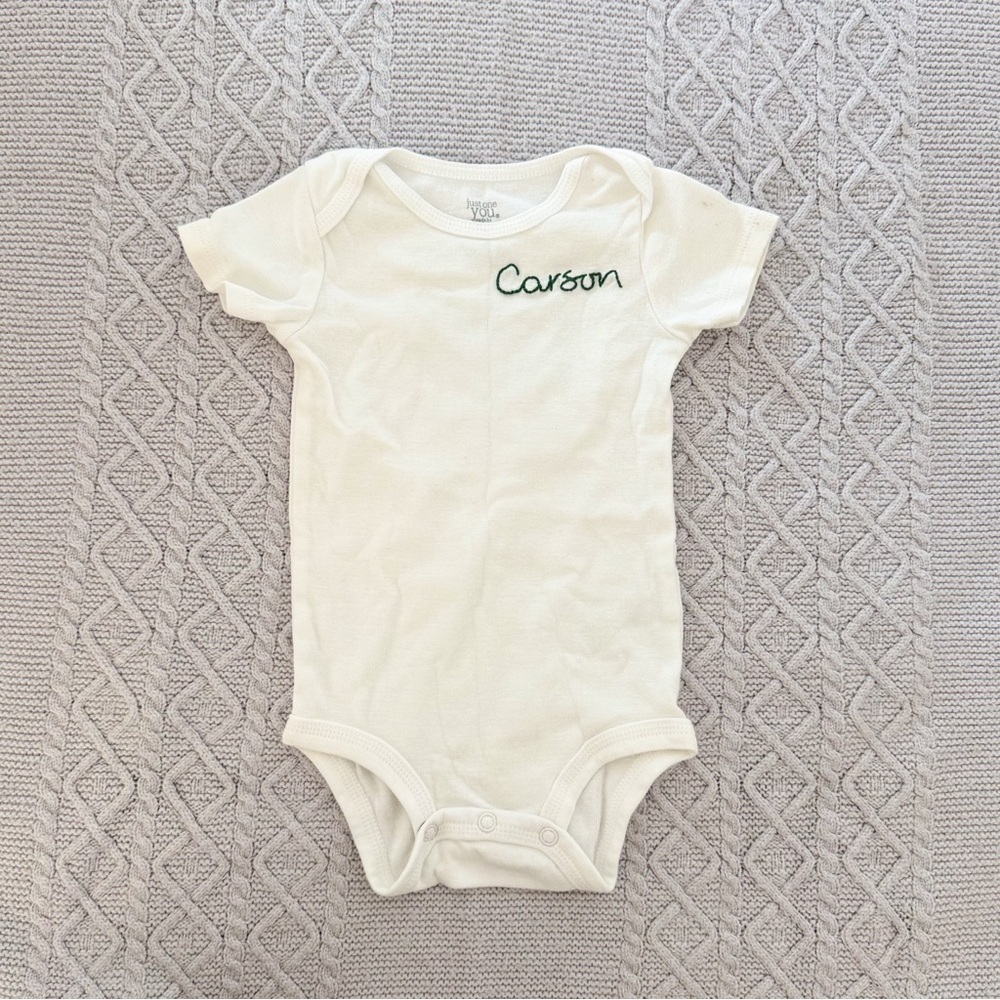 FWB White Baby Onesie with Custom Forest Green Embroidered Name Carson